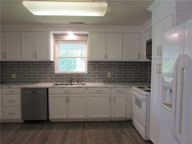 Kitchen has new flooring as does the rest of the h