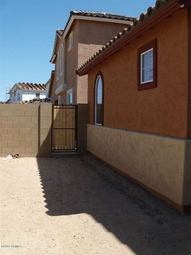 Side of house - gate