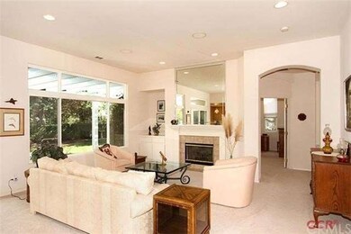 Bright, light spacious living room with a fireplac