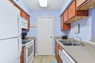 Updated with newer white appliances and plenty of