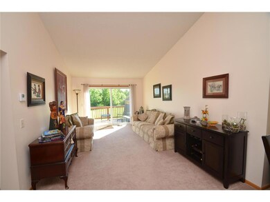 The upper level is vaulted and open., The living r