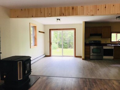 Dining area with slider to back.