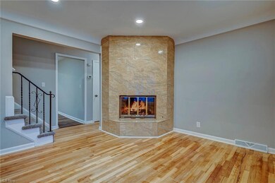 Living Room with gas burning fireplace overlayed w