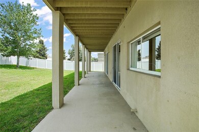 Main floor covered patio across the entire back of