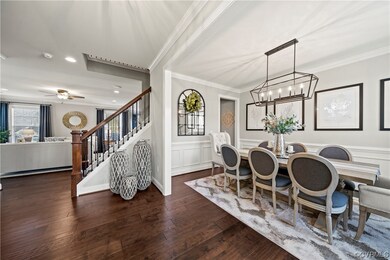 Foyer opens to dining room and designated office/l