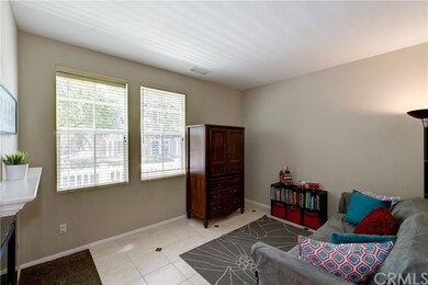 Large Den with Granite Faced Fireplace. Can be con