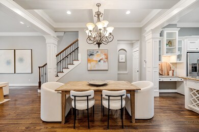 The spacious dining room sits right between the ki