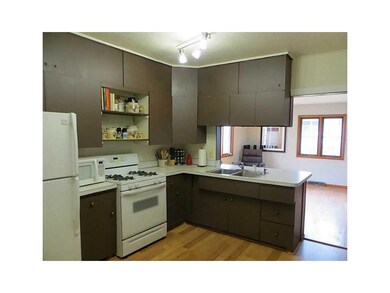 Kitchen. Looking to dining area