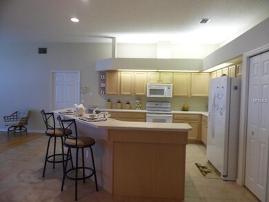 Kitchen with breakfast bar and tons of counter spa