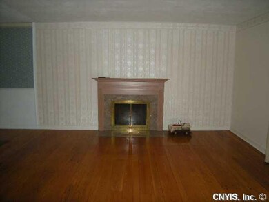 Living Room Livingroom also features woodburning f