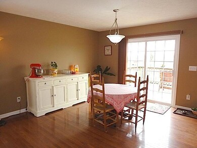 The dining area with the size of 11x13. Looking out to the large pretty back yard with direct access to the deck for those fun summer days.