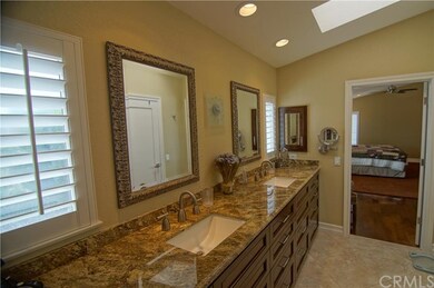 Remodeled master bath with granite counters