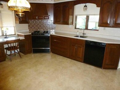 Kitchen. This custom cherry kitchen is not done ju