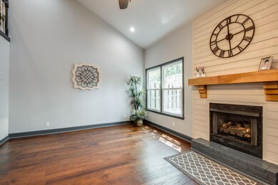 New Gas logs in the fireplace Decorated with Shiplap siding on the fireplace wall