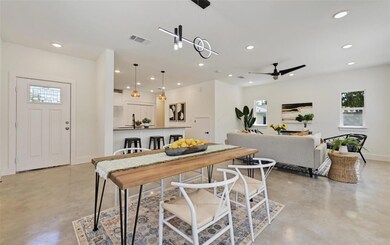 Dining area with concrete flooring, a wealth of n
