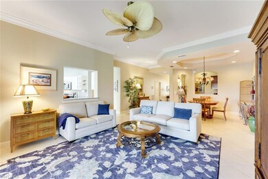 Long view of great room, coffered ceiling, pass-th