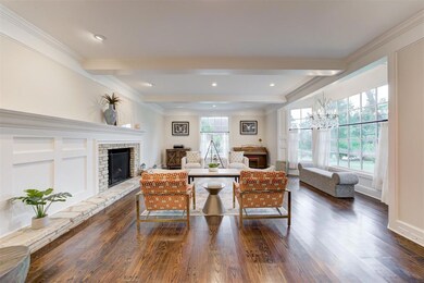 Formal Living room featuring an inviting chandelie