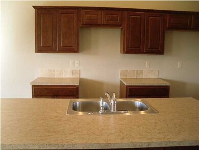 Lovely Kitchen with Wood Laminate Floors