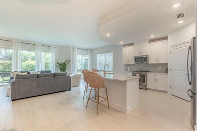 Kitchen with breakfast bar and gas cooking