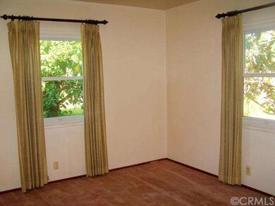 Master bedroom in the real of the home. Nice drape