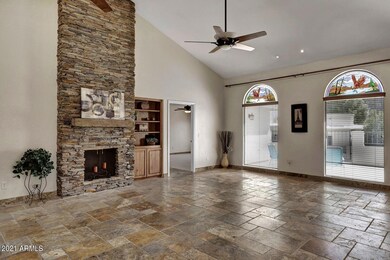 Floor to ceiling stone fireplace