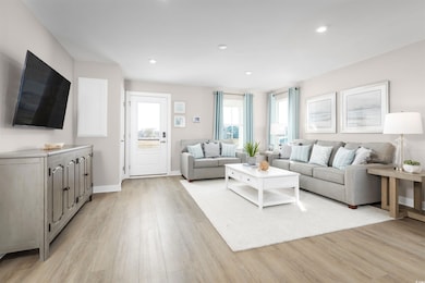 Living room featuring light hardwood / wood-style 