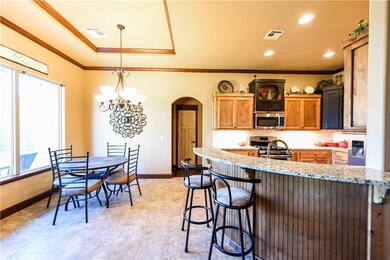 Kitchen and dining room open to living room