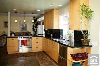 Gourmet kitchen with granite counters and stainles