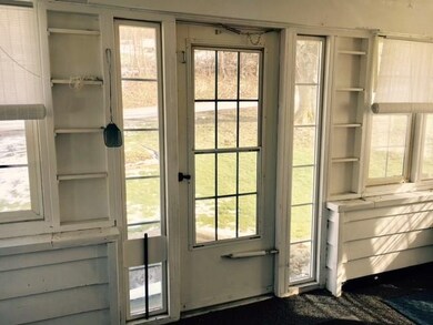 Inside Sun Room to Entrance of the Home.