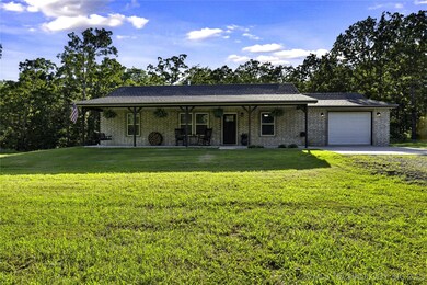 Full-brick beauty set on 5 peaceful acres—framed b