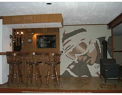 Other. Ceramic wall art. Bar has sink and small fr
