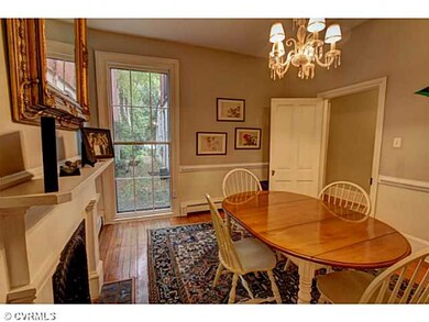 Dining Room - Beautiful woodwork and original floo