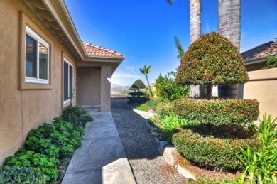 Gated courtyard entry leads to the sleek living an