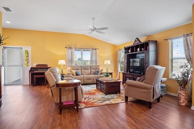 BEAUTIFUL LAMINATE FLOORING AND A VAULTED CEILING!