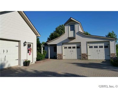 Exterior Front. THREE CAR GARAGE SPACES THE DETACH