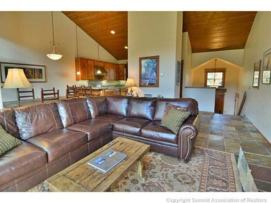 Living Room. Huge vaulted ceilings throughout.