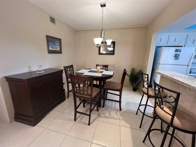Dining area with open concept to the kitchen and l