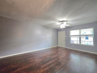 Bright and spacious living room featuring a ceilin