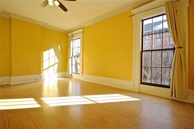High ceilings, tall windows, crown...