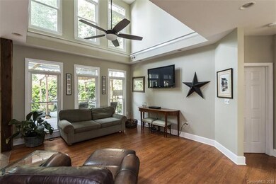 Two story living area bringing in lots of light an