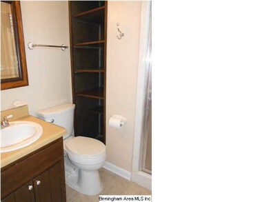 The master bath has built-ins for extra storage