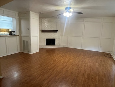Spacious Living room w/fire place, upon entry