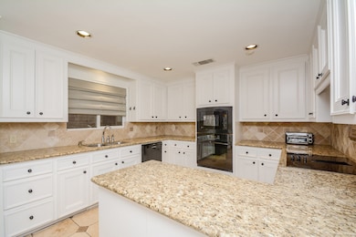 Large kitchen with lots or storage space and granite counter tops