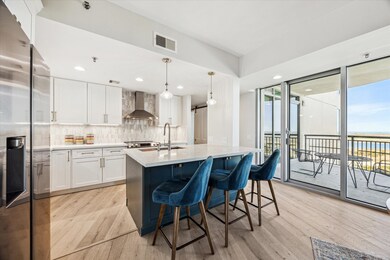 The chef's kitchen features quartz counter tops, s