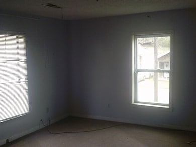 Spare room with visible vents and a wealth of natu