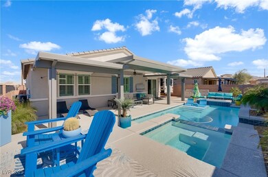 View of pool with a patio area, a fenced backyard,