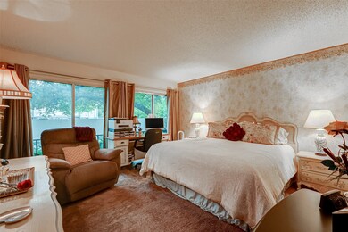 Spacious bedroom that holds enough room for a home