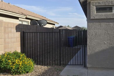 fenced side area in back