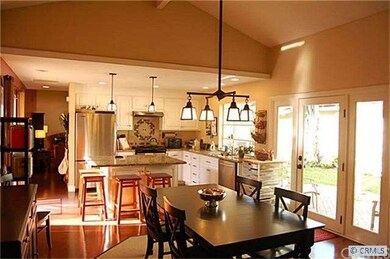 GOURMET KITCHEN AND DINING AREA