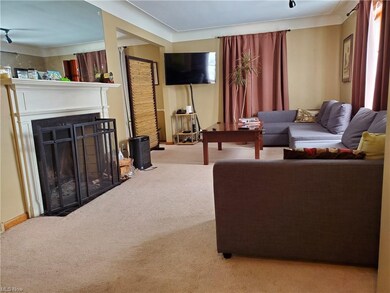 Generously sized living room with woodburning fire